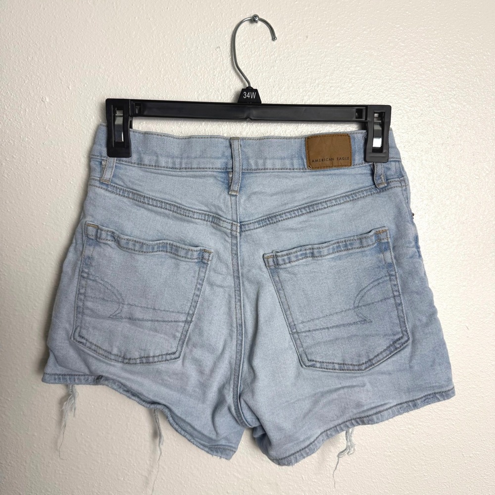 American Eagle Strigid Light Wash Mid Waisted Distressed Denim Shorts Size 00 - Picture 4 of 9